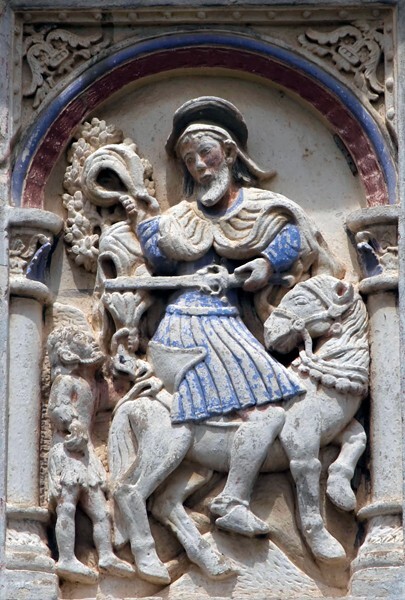 Façade relief, St. Martin - San Martín, façade, posa chapel & atrial cross