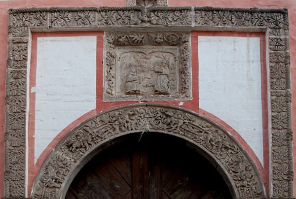 Façade alfiz relief & main portal - San Francisco, façade, portería, cloister & murals