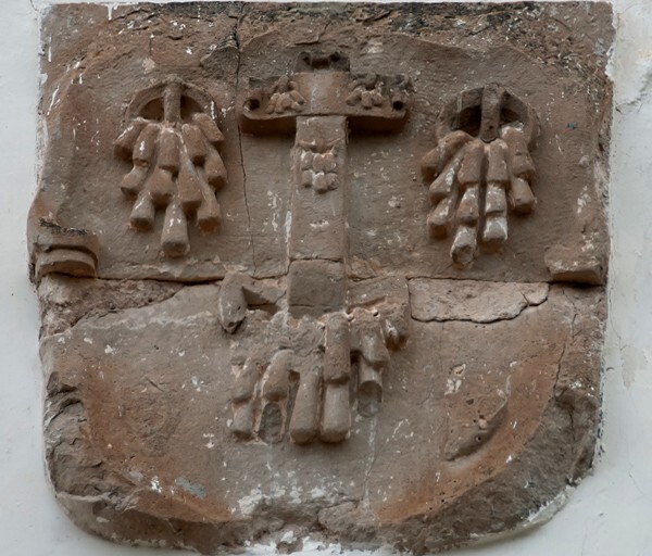 San Miguel, façade alfiz left relief, Cross & wounds - San Miguel Huautla, Oaxaca