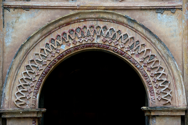 Façade, main portal archivolt - Capilla San Joaquín