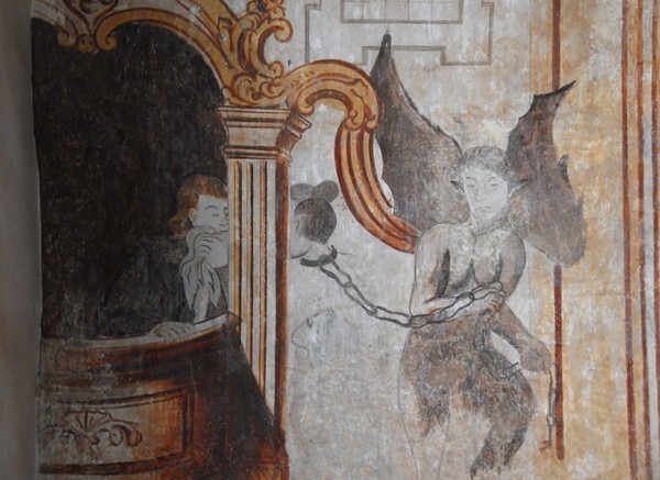 Confession (male confessor chained to a devil) - Lower cloister walk murals