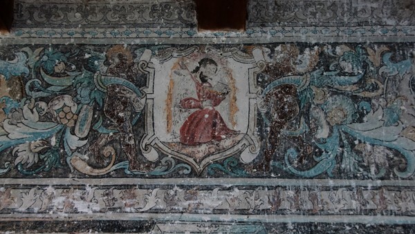 Los Santos Reyes, upper cloister walk frieze mural - Los Santos Reyes, cloister & murals