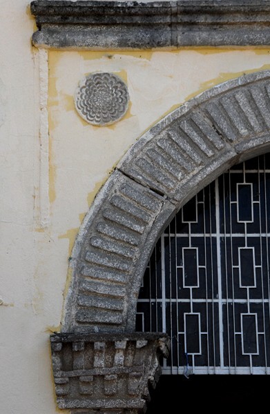 Nicolás Romero, San Andrés, façade portal, left spandrel rosette, a - Nicolás Romero (once San Pedro Azcapotzaltongo)