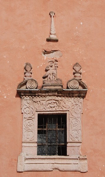San Juan Bautista, façade, bell-tower base, window relief - Victoria, Guanajuato