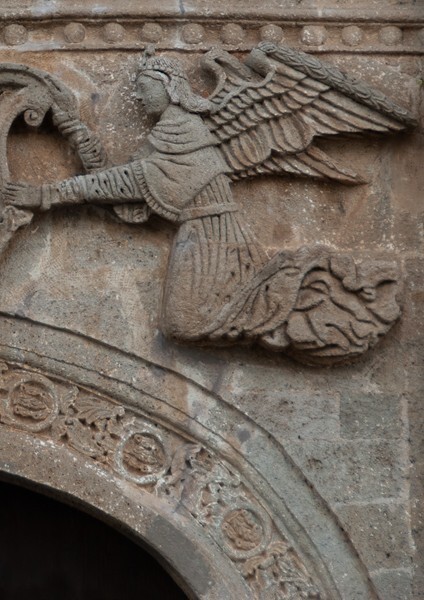 Façade portal, right spandrel, Passion angel - San Andrés, façade, portería & atrial gate