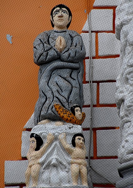 Façade, second tier cornice finial (left) statue, St. Matthew - Nuestra Señora de los Remedios