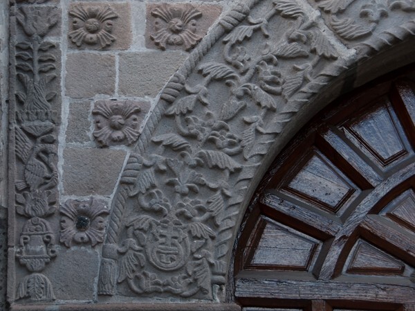 El Cristo Rey, façade, main portal, archivolt & left spandrel - Tulpetlac, México