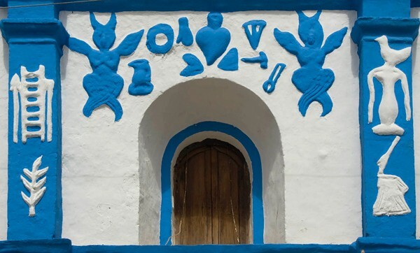 Choir loft window & Passion symbol reliefs - El Dulce Nombre de Cuxtitali