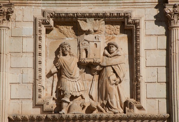 Façade, second story, SS Dominic & Hippolytus upholding the Church - Façade