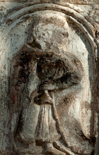 San Juan Bautista (barrio chapel), façade, main portal, right relief - Malinalco, México