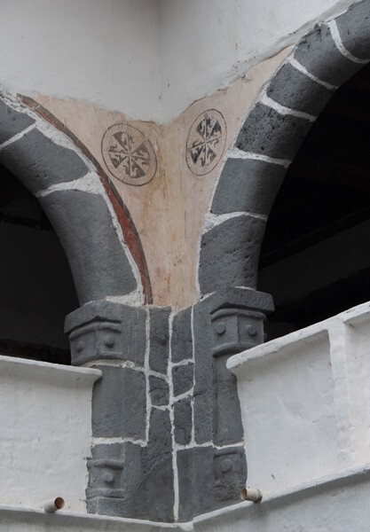 Upper cloister walk, arches & spandrel insignias - San Vicente Ferrer