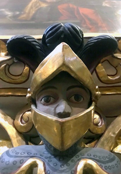 Nave wall closeup, helmeted figure - Capilla del Rosario