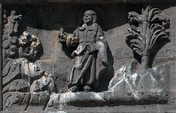 Façade, central panel, base relief (right): Heavens opening to Christ - Nuestra Señora de Guadalupe