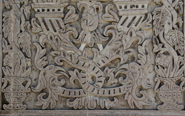 Façade portal, left pilaster, detail - Santiago Apóstol