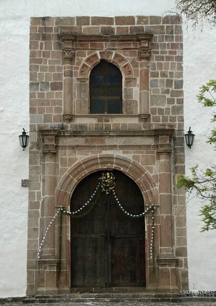 Façade alfiz, portal & choir loft window - San Pedro