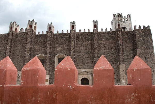 Exterior nave & atrial wall merlons - San Nicolás de Tolentino, façade, bell-tower, portería & nave