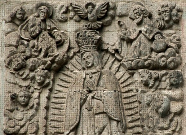 Façade, central relief, detail - San Juan Evangelista y La Guadalupe
