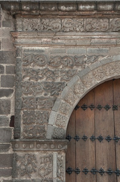 Façade portal, left spandrel - Iglesia Sanctorum