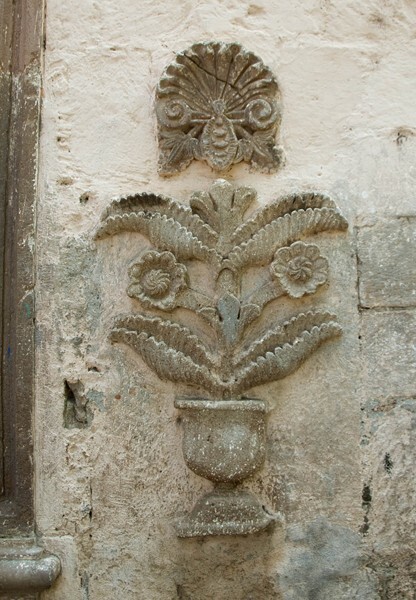 San Diego de Alcalá, façade, main portal relief (right) - Quiroga, Michoacán