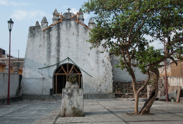 Los Reyes, façade & atrial cross stump - Barrio Chapels