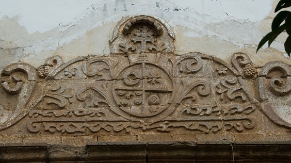 Patio entrance, portal relief - San Juan de Dios