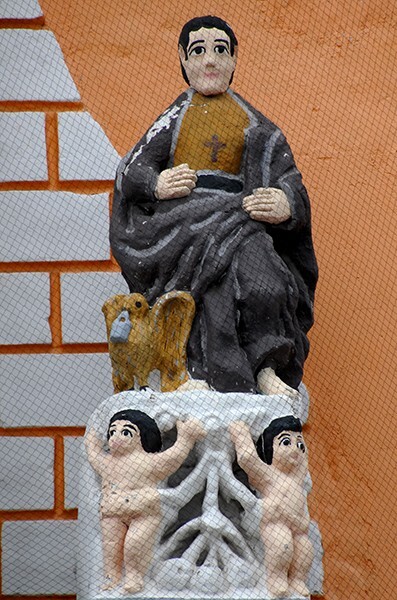 Façade, second tier cornice finial (right) statue, St. John - Nuestra Señora de los Remedios