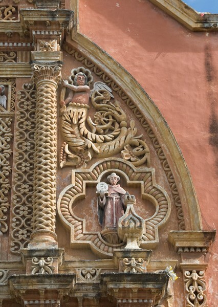 Tercera Orden, upper right façade, St. Bernadine of Siena & merman - Façade, lateral portal & sacristy door