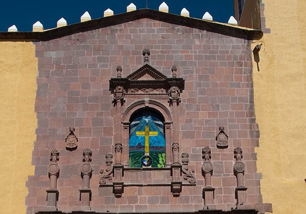 Façade, choir loft window - San Miguel Arcángel, façade, portería, capilla abierta & posa, North portal
