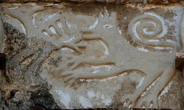 Façade portal, architrave relief (right), lion - San Martín