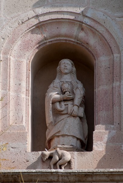 Façade, top tier sculpture - Santa María Magdalena, church & portería