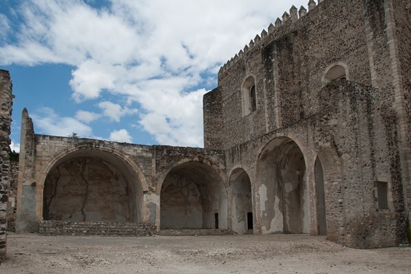 Capillas abiertas - Façade, exterior buttressing, lateral portal, open & posa chapels, atrio & cross