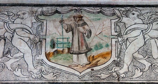 St. Lawrence - San Juan Evangelista, lower cloister walk, frieze mural cartouches