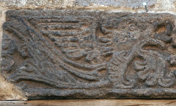Portal lintel relief detail, griffon - Calle Xicohténcatl #9