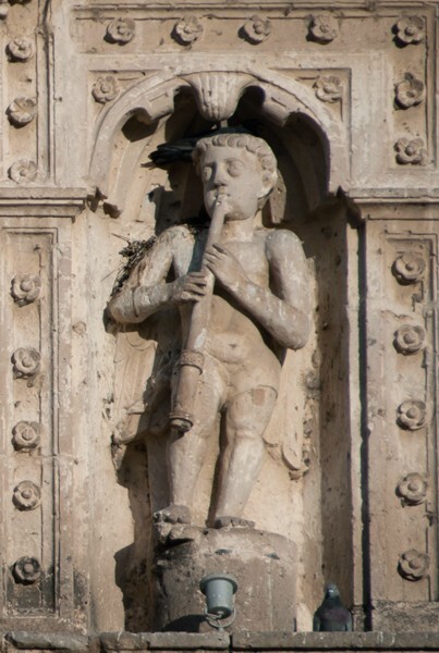 Façade architrave musician (right) - San Pablo, façade, portería & convento