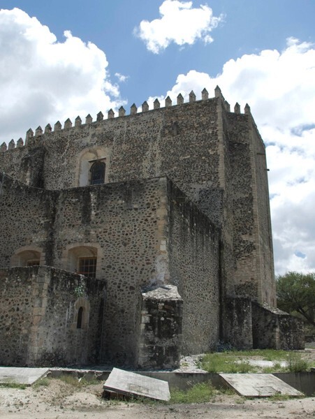 Apse - Façade, exterior buttressing, lateral portal, open & posa chapels, atrio & cross