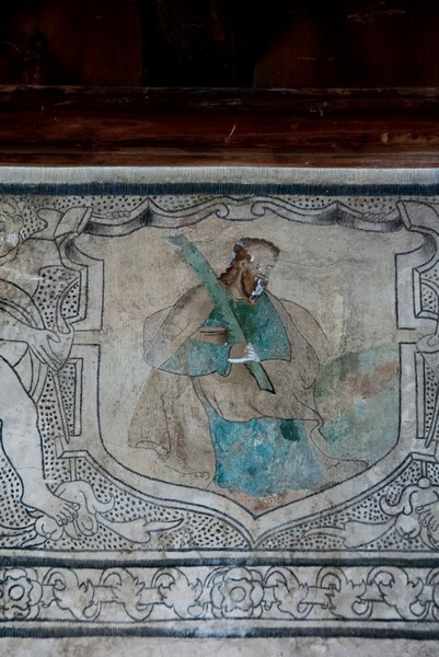 Friar with reed - San Juan Evangelista, lower cloister walk, frieze mural cartouches