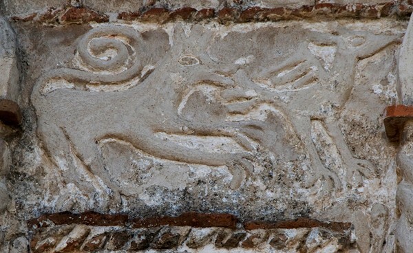 Façade portal, architrave relief (left), coyote - San Martín