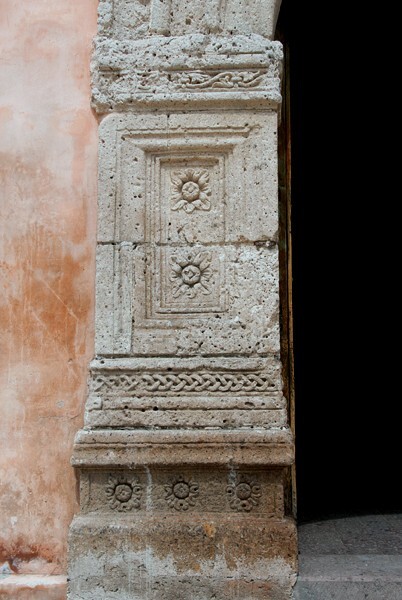Façade portal pilaster (left) - San Francisco, façade, roof cross, cloister