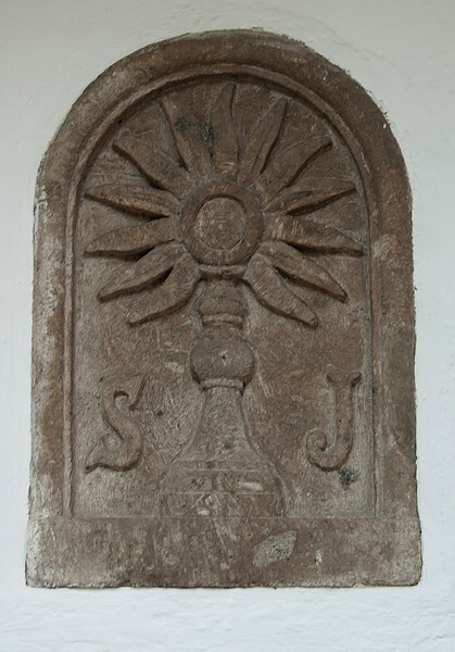 Convento wall, stone relief, monstrance - San Jacinto de San Angel