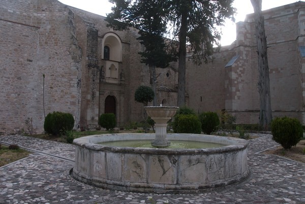 Lateral portal & fountain (capilla abierta rear, right) - San Pedro y San Pablo