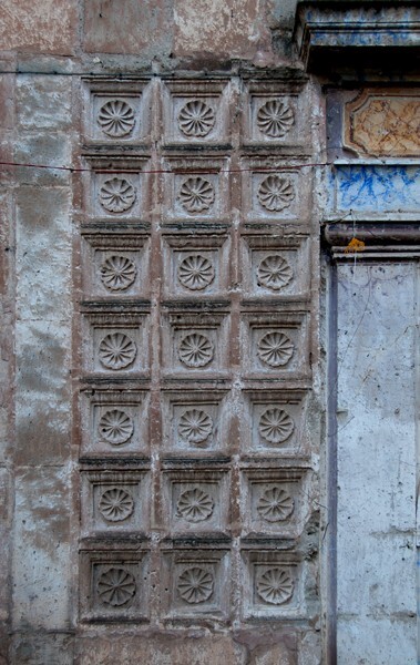 Façade portal, left coffering & rosettes - San Miguel Arcángel