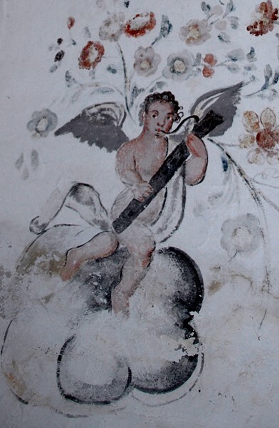 San Gabriel Arcángel, baptistry mural, cherub playing bassoon - San Gabriel Azteca, Hidalgo