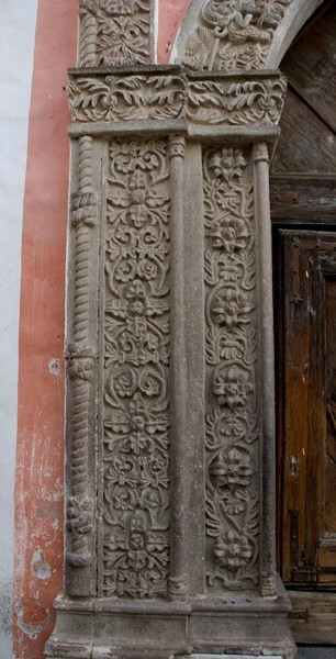 Façade portal, left pilaster - San Francisco, façade, portería, cloister & murals