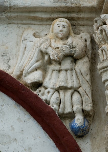 Façade portal, right spandrel - San Martín