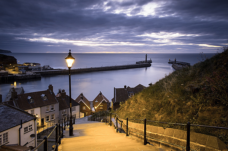 Night time landscape photograph of the 199 steps at Whitby Abbey on the north Yorkshire coasty