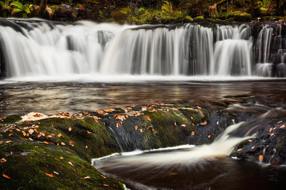 Landscape image of flowing water in Lower Gushing Falls