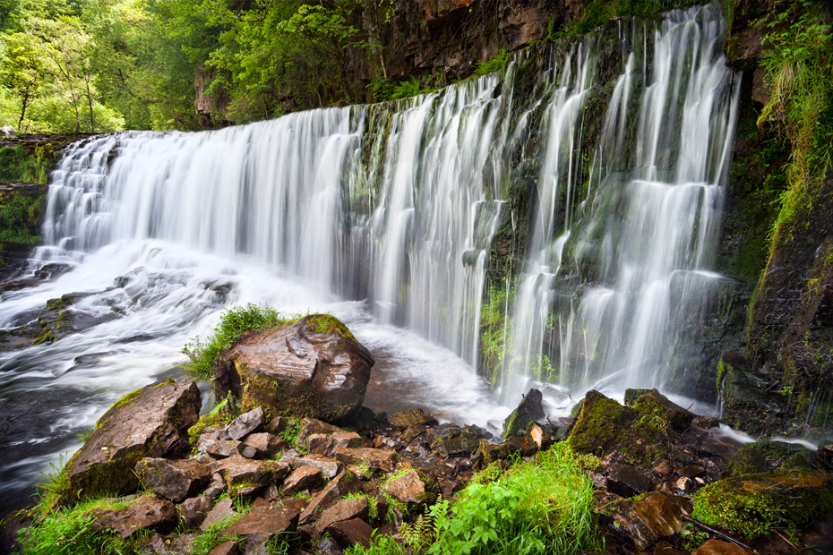 Powerful waterfall in the beautiful woodland of the Brecon Beacons