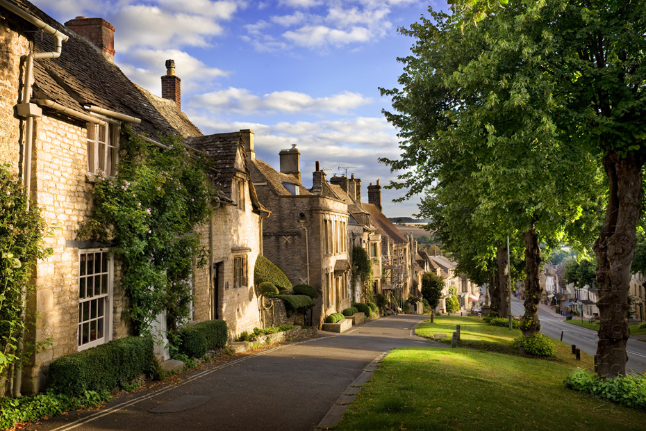 View down Burford High Street in the warm morning sunshine