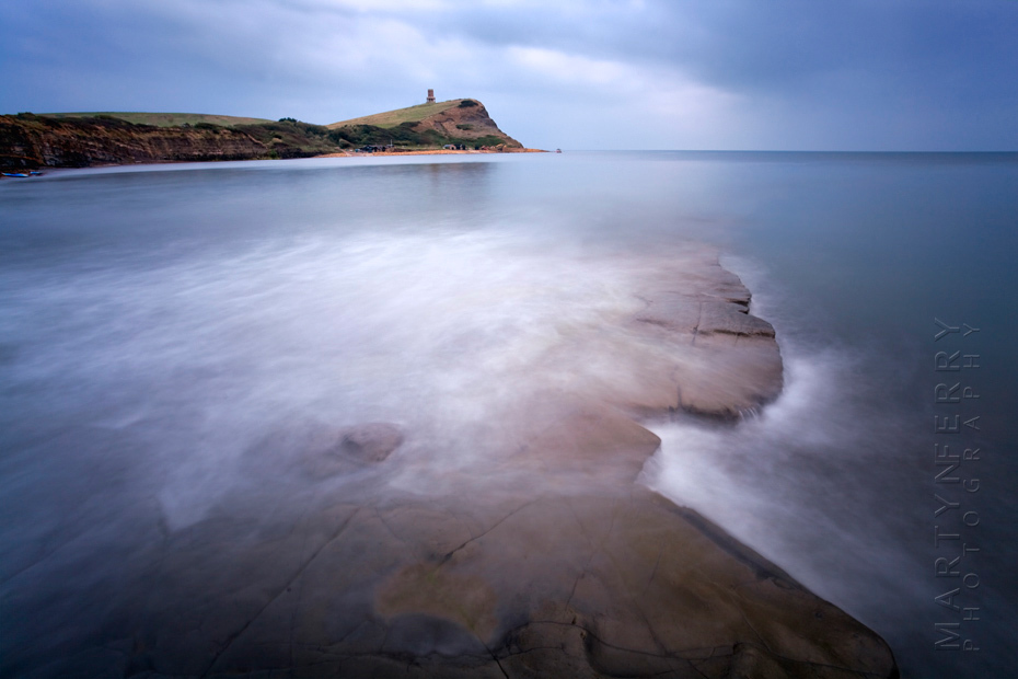 Rock shelves in a blue ocean at Kimmeridge Bay