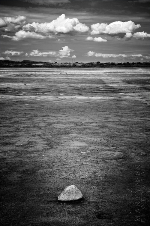 Fine art image of empty landscape and rock